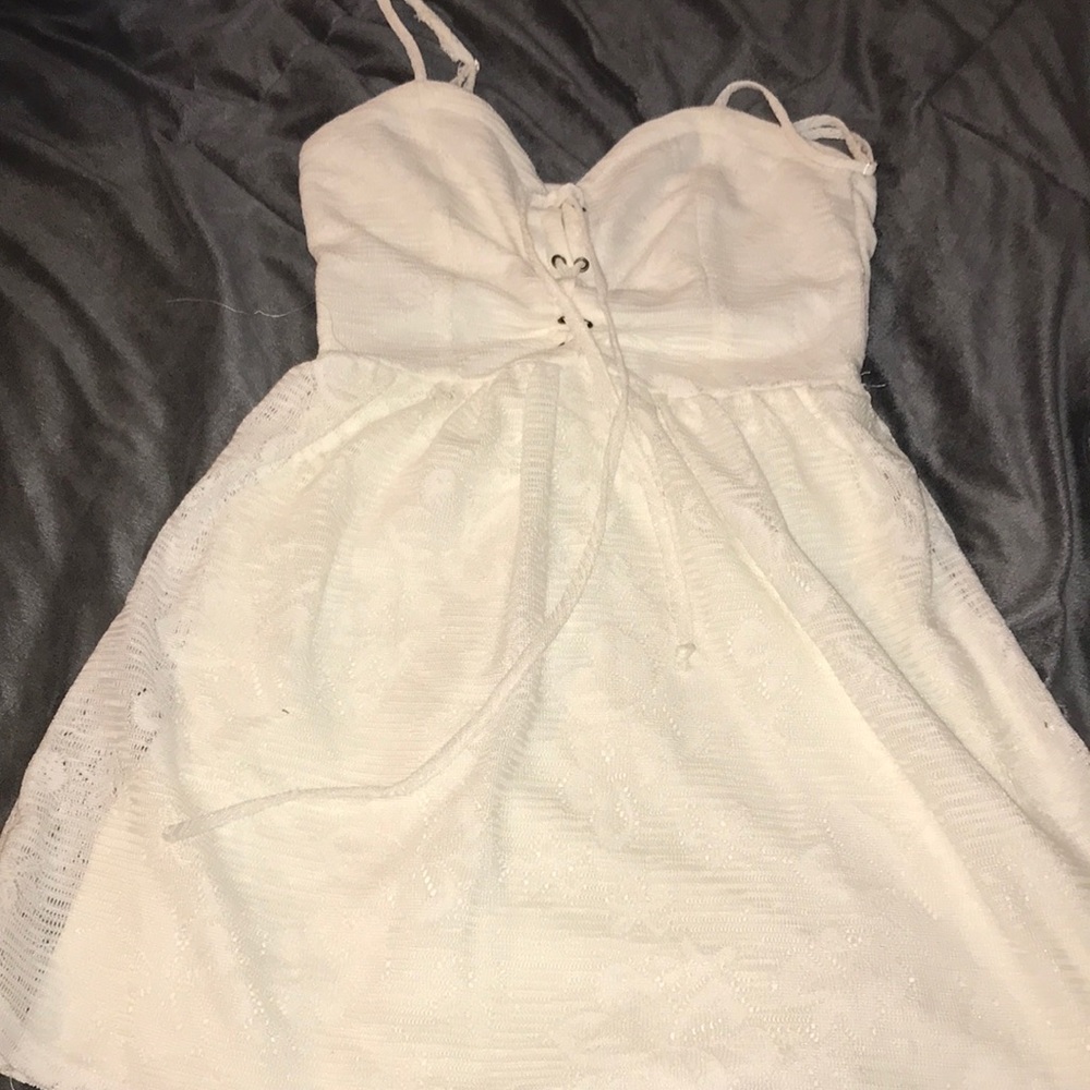 Women’s white small dress.